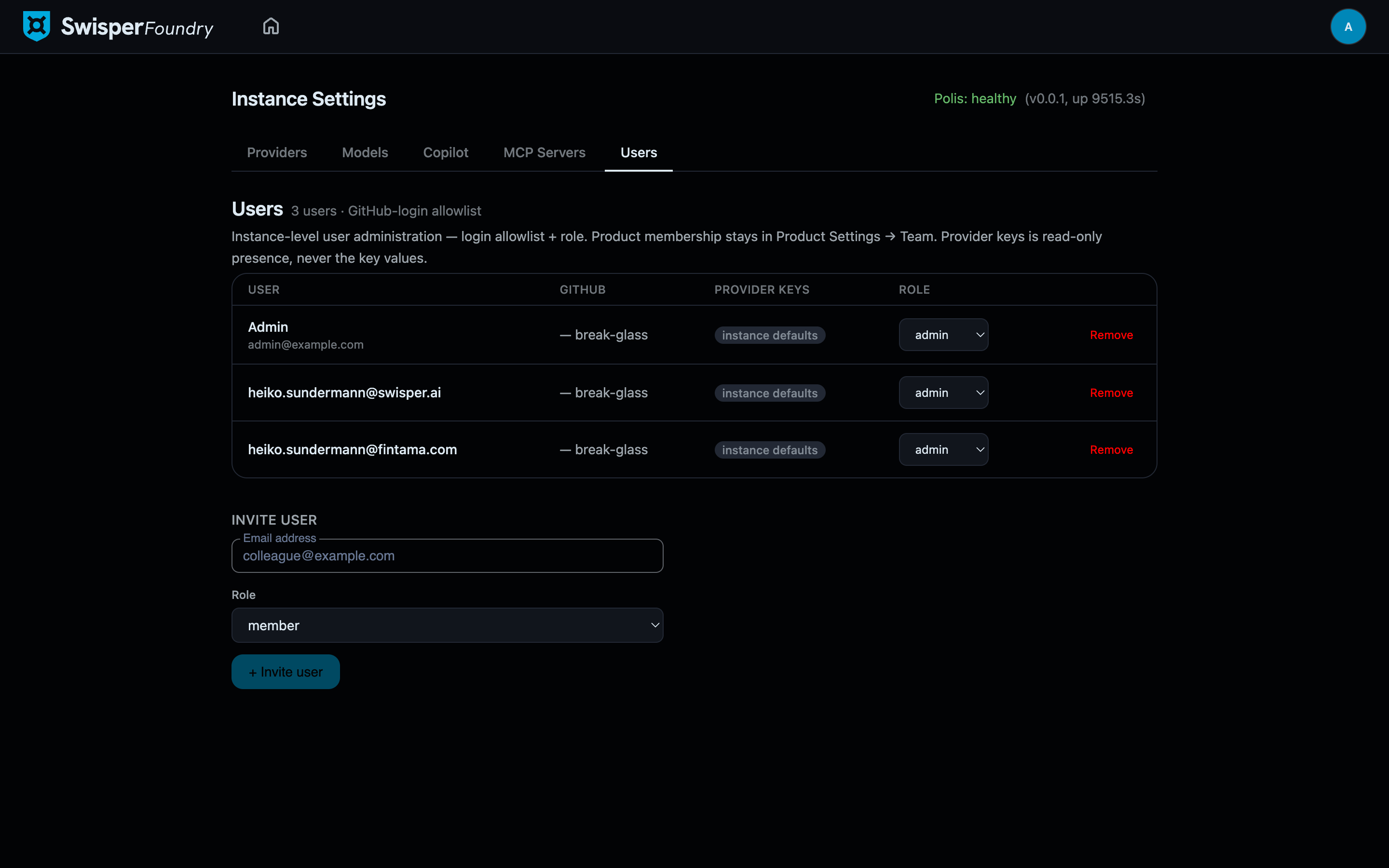The Users tab listing accounts with role, status, provider-key count, and invite controls
